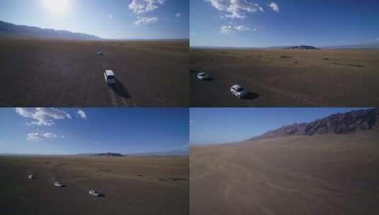 B新疆准噶尔盆地大漠戈壁车队行驶1高清在线视频素材下载