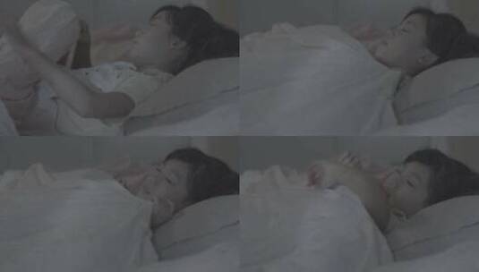 4k灰度小女孩盖被子睡觉高清在线视频素材下载