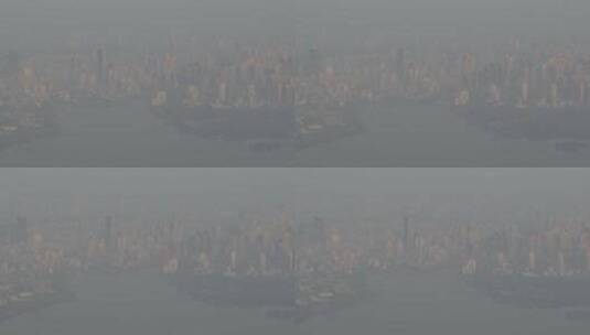 航拍武汉东湖公园清晨大雾城市建筑高清在线视频素材下载