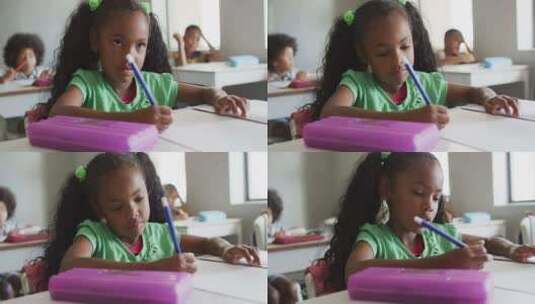 专注的非裔美国女孩在课堂上上课的视频高清在线视频素材下载