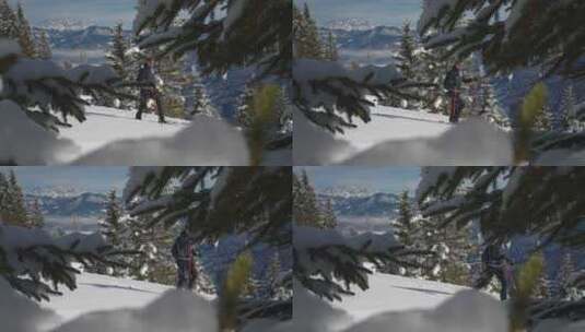 男子滑雪穿越白雪覆盖的森林高清在线视频素材下载
