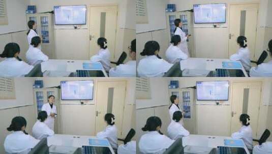 医院专家教授给医生护士们讲解知识和病历高清在线视频素材下载