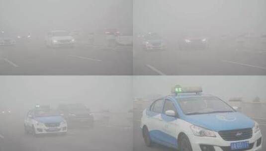 雾中行驶汽车出租车高清在线视频素材下载