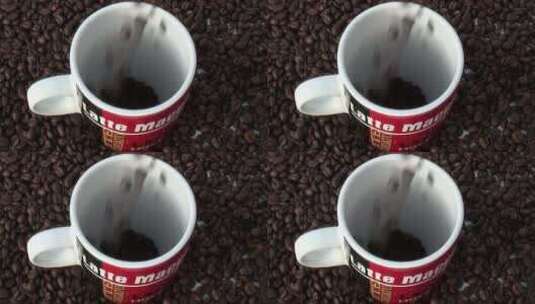 一杯加新鲜烘焙咖啡豆的咖啡高清在线视频素材下载
