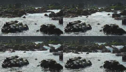 岩石上溢出的水冲向大海，静态特写慢动作高清在线视频素材下载