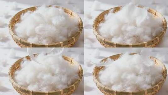 冬季保暖白色羽绒羽毛蓬松飘落特写视频高清在线视频素材下载