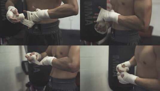 年轻的拳击手拉着手上的白色绷带准备出击高清在线视频素材下载