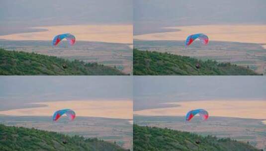 带滑翔伞的人高清在线视频素材下载