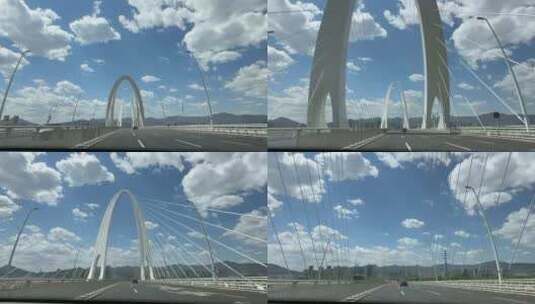 开车拍摄蓝天白云下的铁索大桥超长视频高清在线视频素材下载