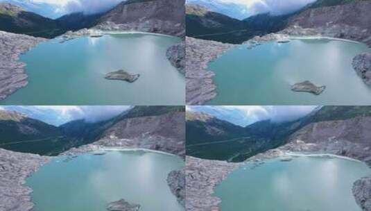 俯瞰山谷的山顶上美丽的冰川湖高清在线视频素材下载