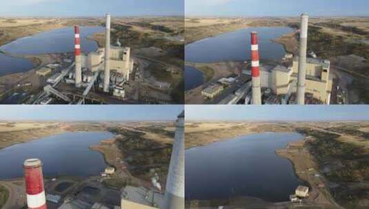 日落时北美乡村发电厂的空中4k镜头。慢速前倾高清在线视频素材下载