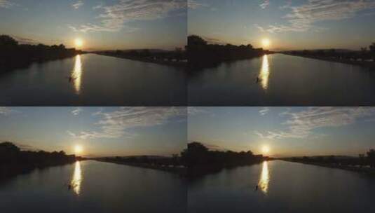 日落时分在湖上划船高清在线视频素材下载
