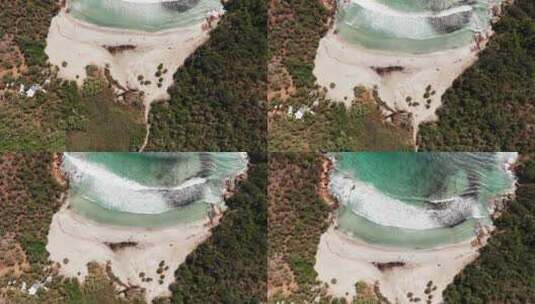 鸟瞰白沙滩海洋波浪堤高清在线视频素材下载