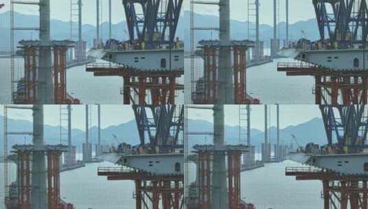 4k航拍珠海黄茅海跨海大桥钢箱梁吊装高清在线视频素材下载