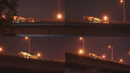 夜晚桥上经过的水泥搅拌车工程罐车高清在线视频素材下载