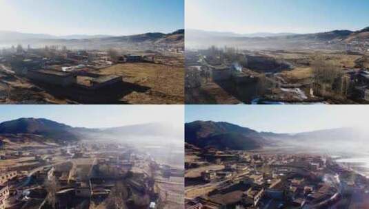 4k藏族炊烟袅袅的村落航拍高清在线视频素材下载