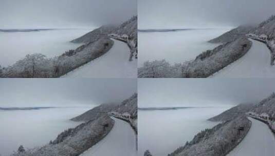 航拍湖北神农架冰雪云海雪松雪景公路高清在线视频素材下载