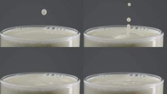 慢镜头特写一滴牛奶落到液面创意视频高清在线视频素材下载