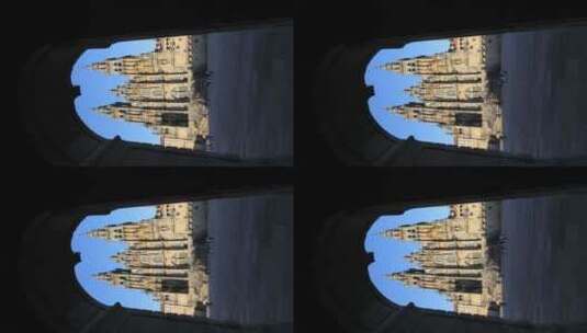 从拱形门视角拍摄大教堂建筑景观高清在线视频素材下载