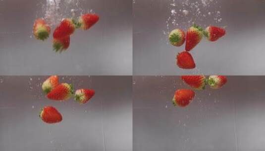 草莓入水慢动作升格视频高清在线视频素材下载