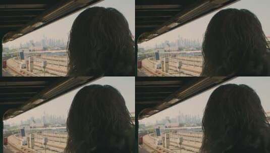 女人透过车窗看城市风景高清在线视频素材下载