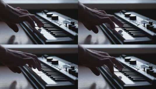 用音乐键盘演奏的音乐家高清在线视频素材下载