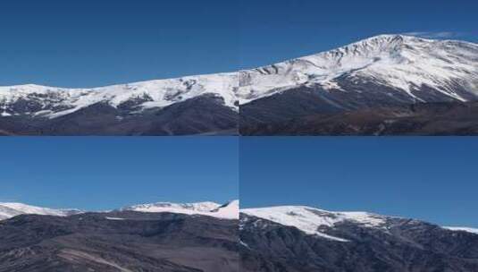 蓝天下的贡嘎雪山山脉高清在线视频素材下载