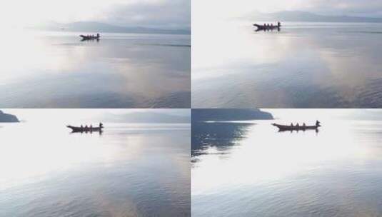云南泸沽湖水面渔船前行高清在线视频素材下载