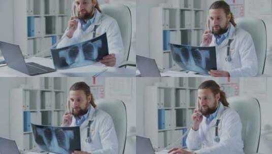 医生一边打电话一边看胸部x光片高清在线视频素材下载
