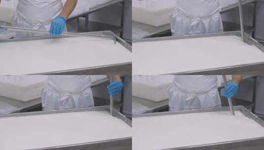 工人操作食品加工设备高清在线视频素材下载