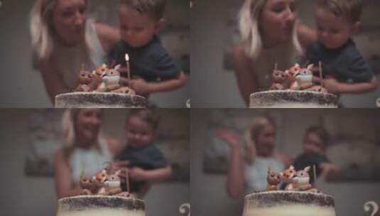 吹灭生日蛋糕上的蜡烛高清在线视频素材下载