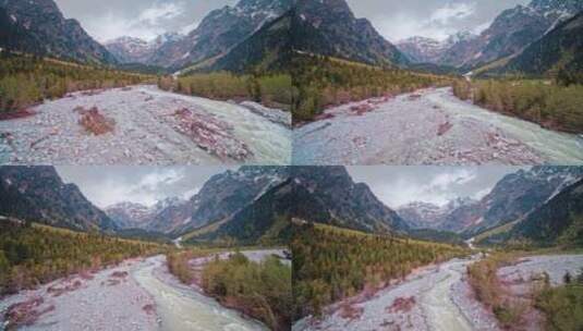 白雪覆盖的山脉上的河流高清在线视频素材下载