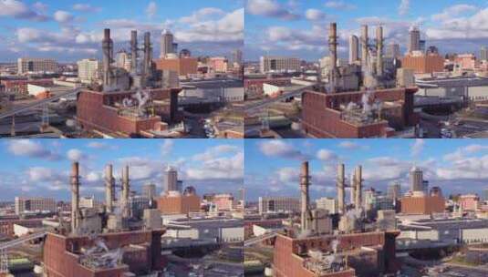 航拍蓝天白云下的城市工厂高清在线视频素材下载