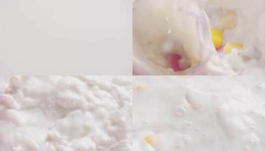 芒果粒落入牛奶慢镜头高清在线视频素材下载