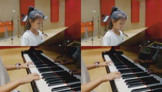 小朋友在录音棚里弹钢琴高清在线视频素材下载