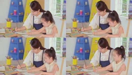温馨家庭画画的母女二人高清在线视频素材下载