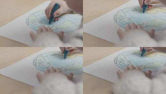孩童涂鸦地球地图的特写高清在线视频素材下载