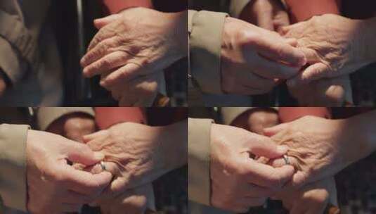 老年丈夫给妻子戴结婚戒指高清在线视频素材下载