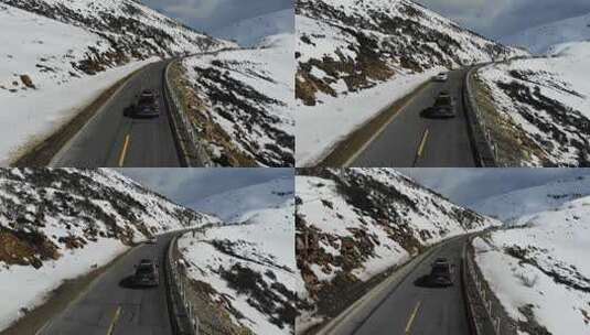 航拍318国道翻越色季拉山垭口的自驾游车辆高清在线视频素材下载