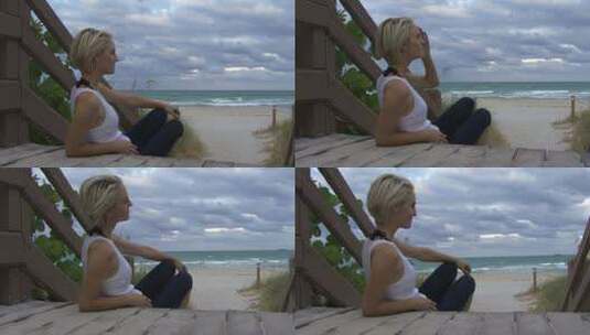女性在海滩附近放松高清在线视频素材下载