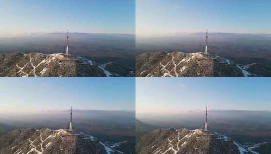 比奥科沃Sveti Jure峰上的通讯塔。蓝天映衬下田园诗般的雪山高清在线视频素材下载