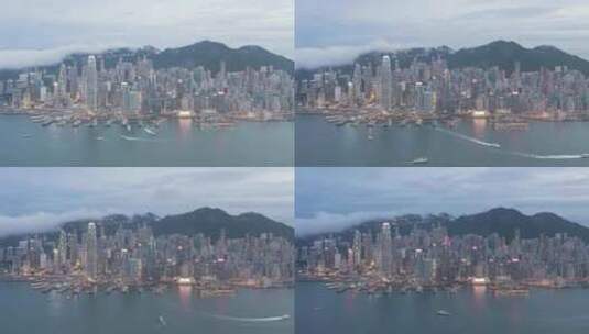 鸟瞰香港的现代化建筑及繁忙的水上船只高清在线视频素材下载