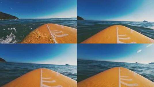 趴在冲浪板上划水-运动高清在线视频素材下载
