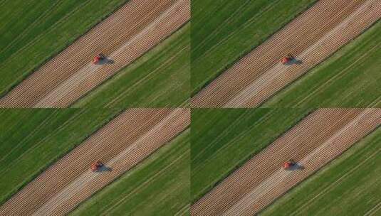 航拍农业机械收割麦子高清在线视频素材下载