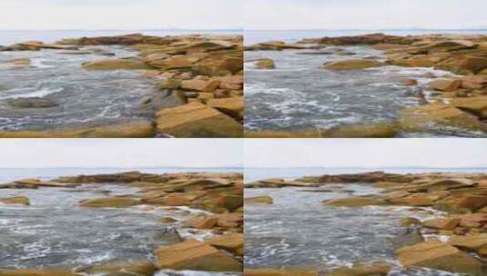 海南三亚海边沙滩海浪拍打礁石竖屏高清在线视频素材下载