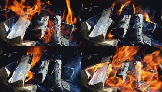 在烤架上，火在燃烧柴火在烤架上燃烧高清在线视频素材下载
