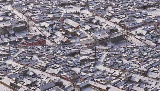 雪乡东北风景白雪覆盖下的村庄全貌航拍高清在线视频素材下载