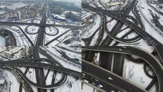 冬季立交桥路上飘雪的鸟瞰图高清在线视频素材下载