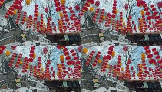 新年大红灯笼上的积雪高清在线视频素材下载