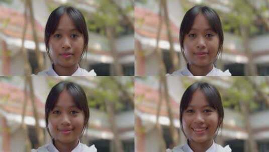 一个快乐微笑可爱的亚洲高中生女孩，短发，高清在线视频素材下载